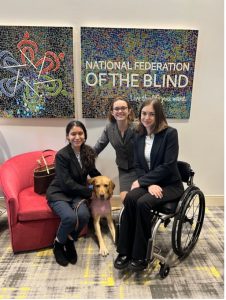 Emely Recinos, Carly Bastedo, Kaitlin Sommer in the lobby of the National Federation for the Blind