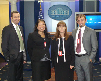 2010 DPL Interns - Ben Nichols, Jane Zhi, and Peter Christian pictured at the White House with Eve Hill, former BBI senior vice president.