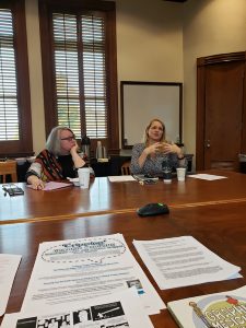 Rachael Zubal-Ruggieri, on left, listening to Elizabeth Donaldson, on right, during her workshop, "Drawing Out the Public Sphere: A Workshop on ‘Cripping’ Graphic Medicine"