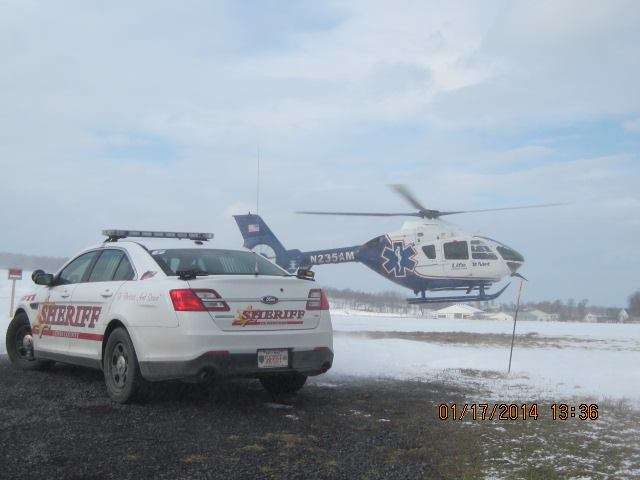 Medical Transport Helicopter touches down in Lewis County by a Sheriff's patrol car.