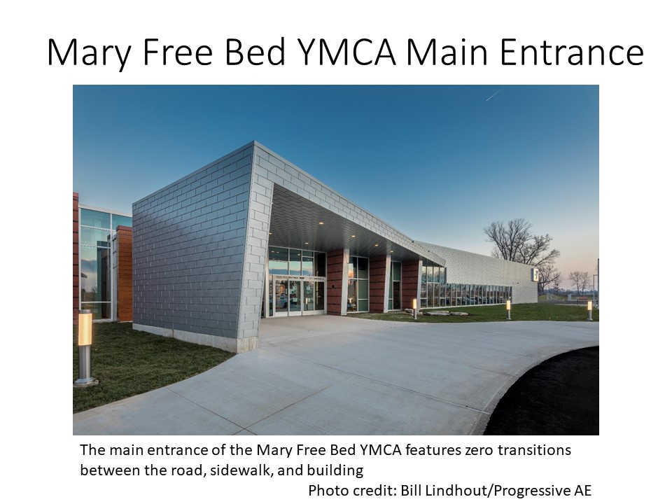 The main entrance of the Mary Free Bed YMCA features zero transitions between the road, sidewalk, and building. Photo credit: Bill Lindhout/Progressive AE