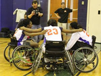 basketball team in wheelchairs hovering