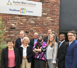 Left to right: Mary Morder, Chancellor Kent Syverud, Dr. Ruth Chen, Barry Whaley, Pam Williamson, Bandit, Matt Ter Molen, Cyndi Smith, Matthew Ramsay, Dr. Peter Blanck