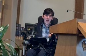 Leo speaking at the pulpit