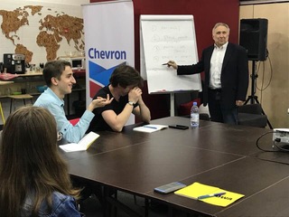 Photo of Stephen Kuusisto teaching a poetry workshop in Almaty, Kazakhstan. “It’s not what you see,” he’s saying, “it’s what’s inside you.”